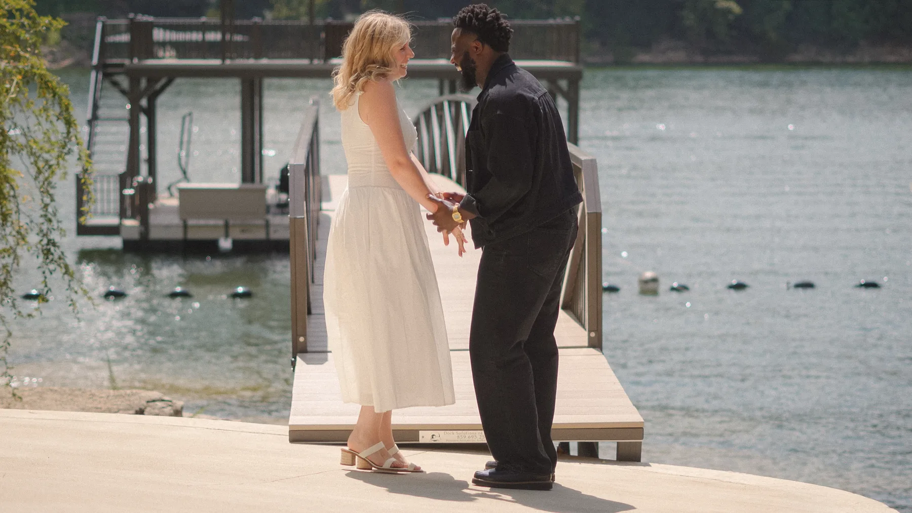 Facing each other on the shoreline