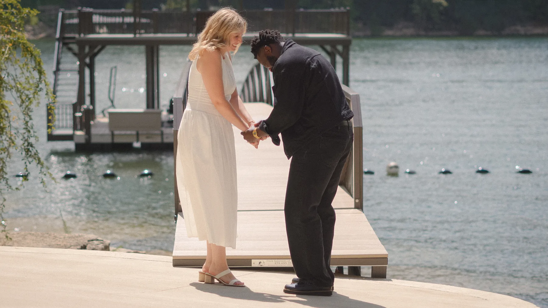 Hands held, looking out over the lake