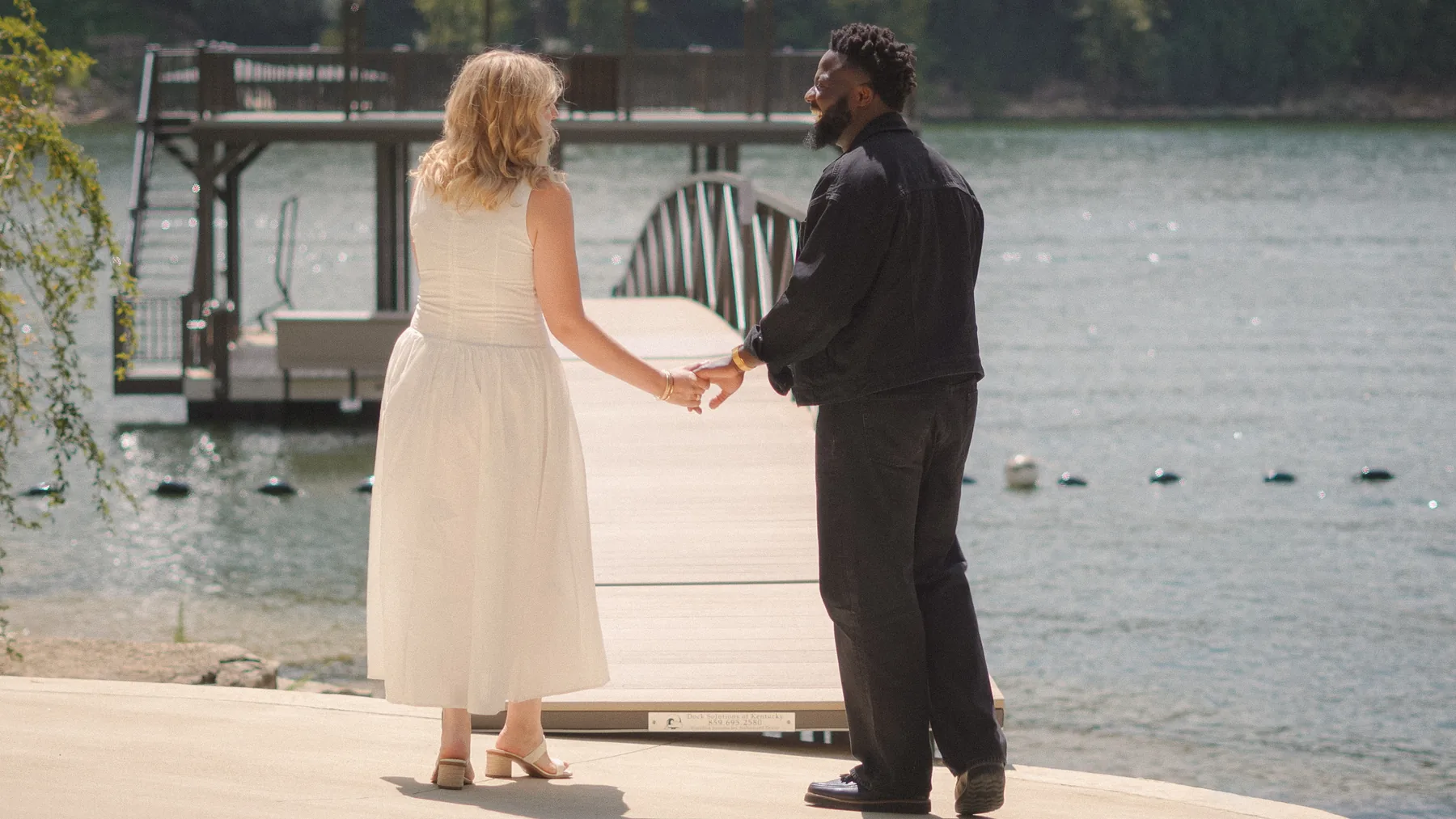 Holding hands at the water's edge