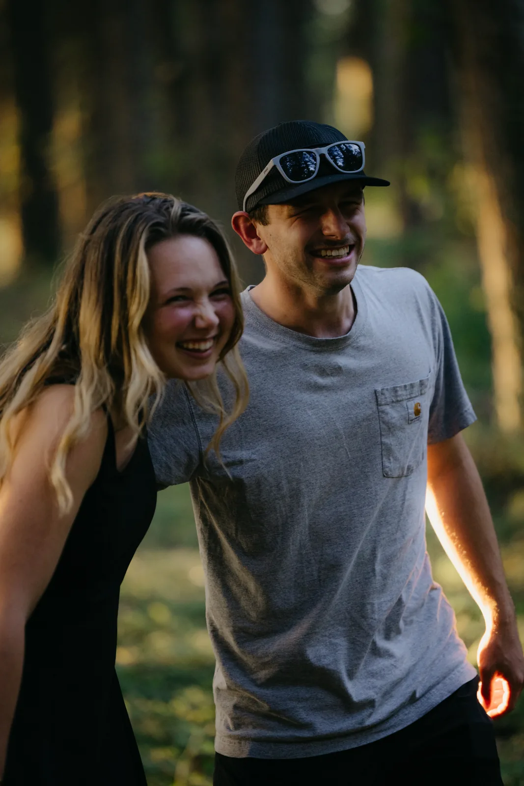 Walking and laughing together through the forest