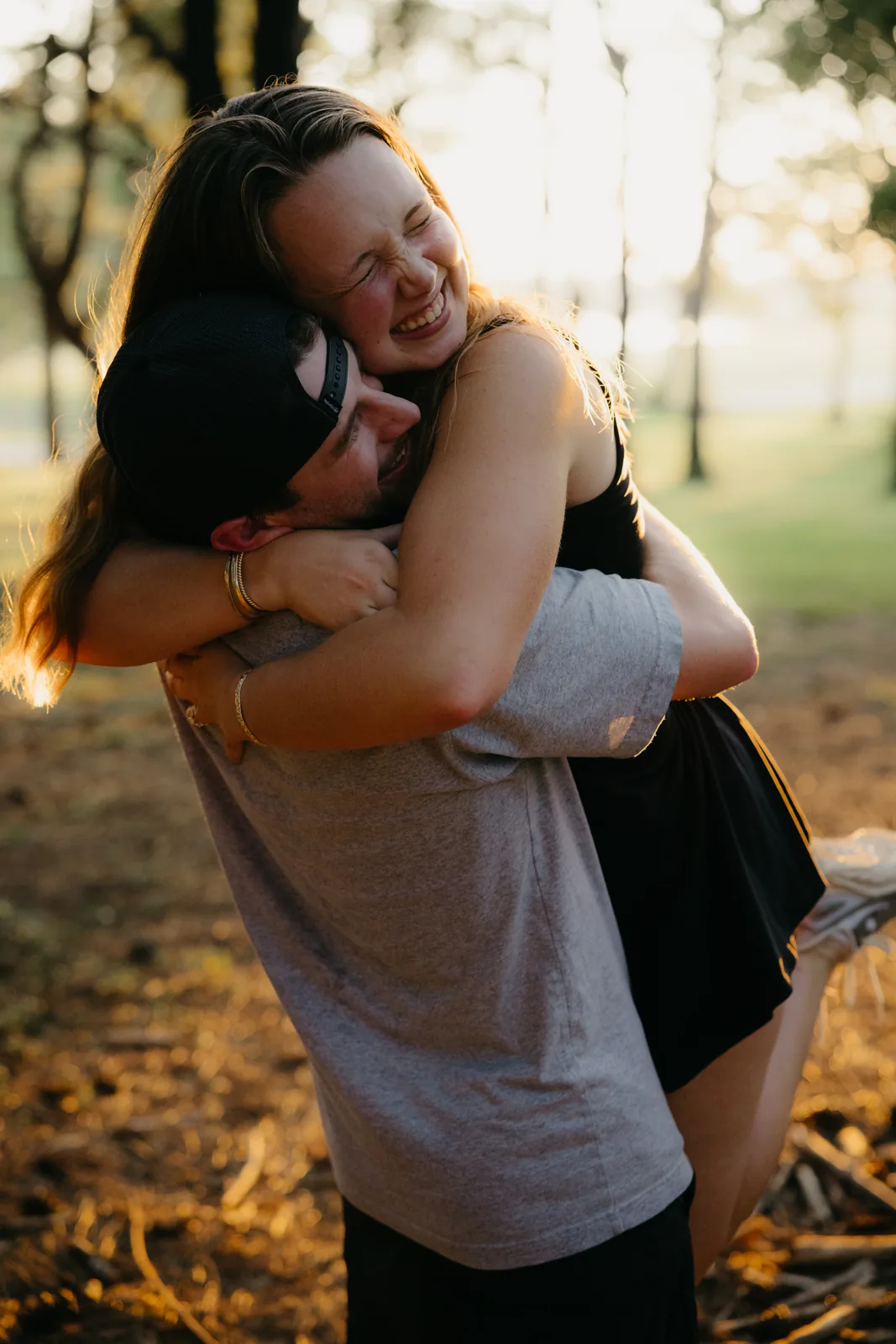 Lifted off her feet in a hug